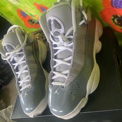 Gray & White Jordens  size 6