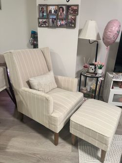 Upholstered chair and ottoman