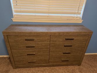 Ashley furniture’s Culverbach Queen Bedframe with Dresser and chest bedroom set.