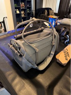 Cat / small dog carrier. New in packaging. Servers available