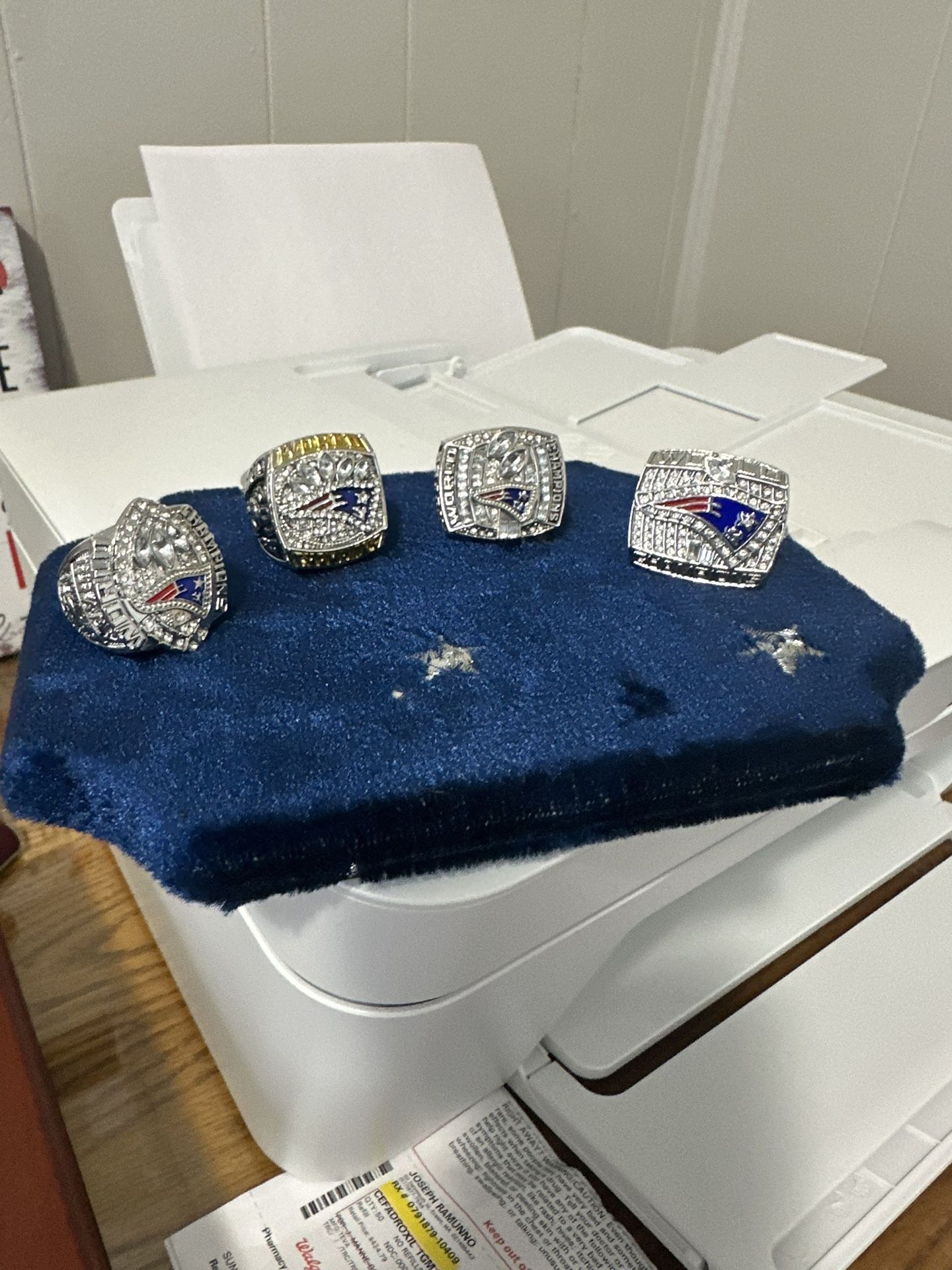 Tom Brady Super Bowl Rings With Hand Display