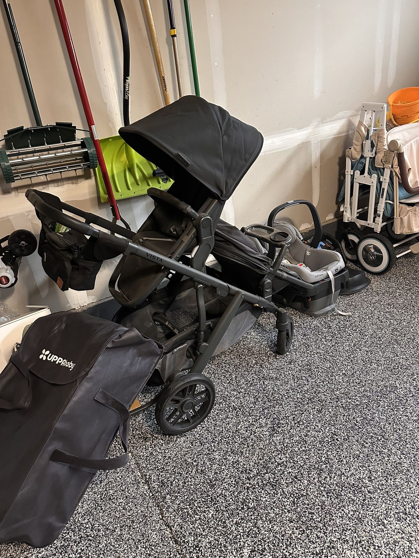 Up a baby stroller with bassinet and two full seats