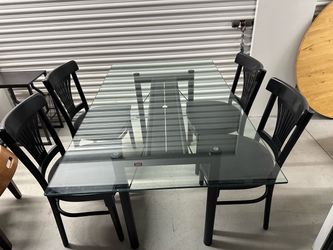 Kitchen glass table with 4 chairs pretty heavy