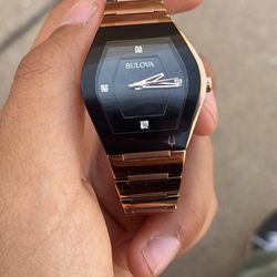 Bulova rose gold watch black face diamond accents