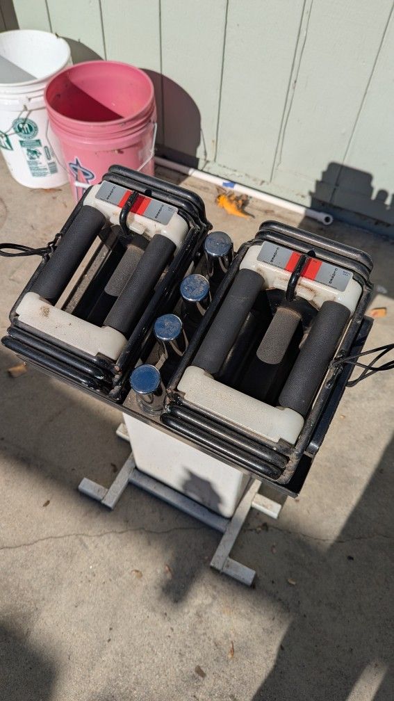 Powerblock Dumbbells With Stand.
