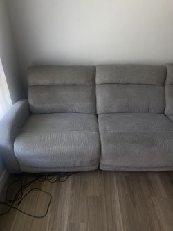Grey sectional & Pillows
