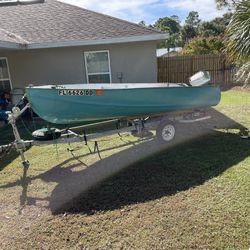 Boat Trailer And Outboard Motor 