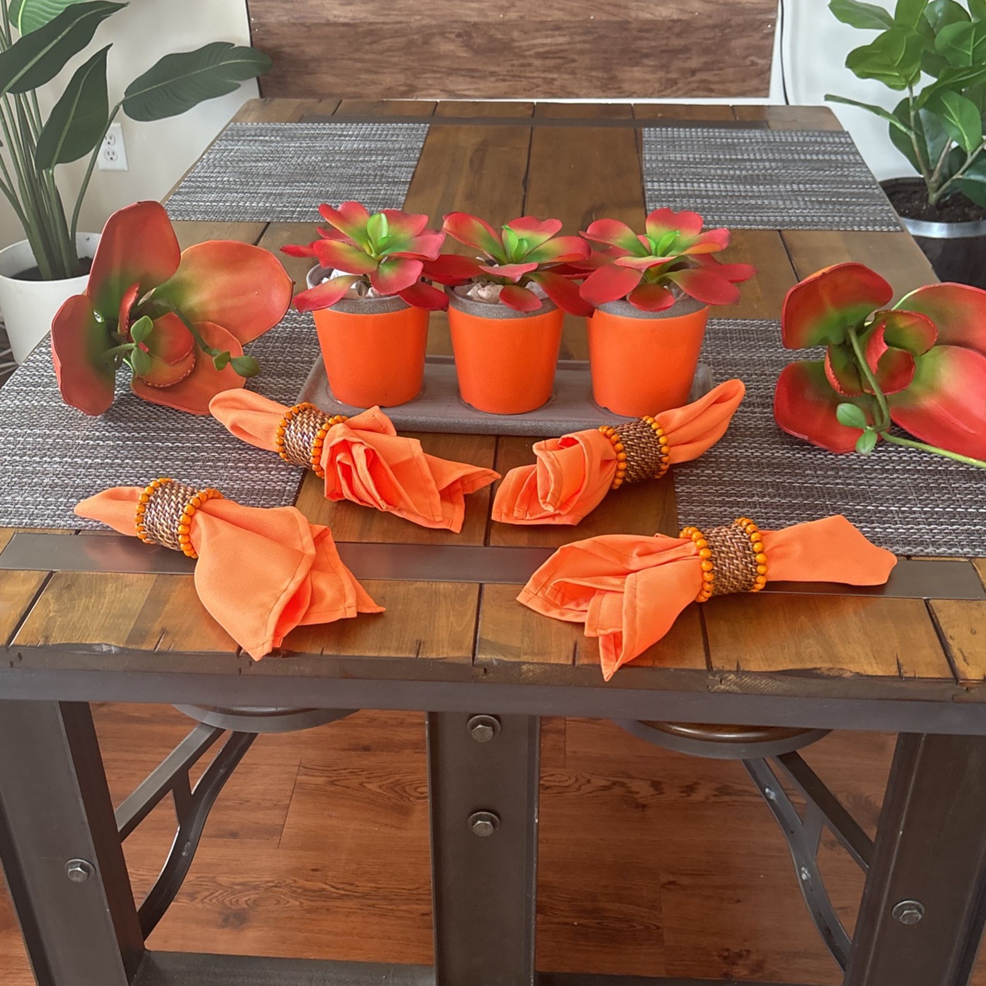 Napkins And Holders And Flowers