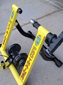 INDOOR BICYCLE TRAINER. ADJUSTABLE MAX RIDER PRO TRAINER. YOU CAN USE IT WITH ANY KIND OF BIKE.
