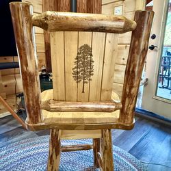 Two “Montana Woodwork” counter height swivel stools