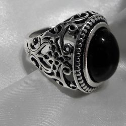 Stainless steel  and Black Onyx ring size9