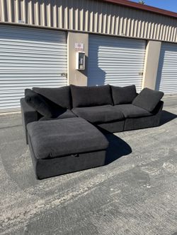 Black 4 Piece Modular Cloud Couch W/ Storage Ottoman ( Can Deliver For $10 )