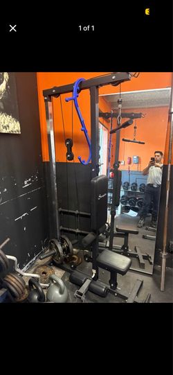 Lat pull down machine
