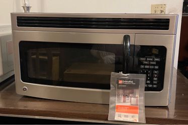 GE 1.5 cu. Ft. Over-the-Range Microwave Oven with Recirculating Venting