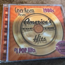 CASEY KASEM PRESENTS AMERICAS TOP TEN 1980’s HITS - CD 2004 - 20 TRACKS -   $3