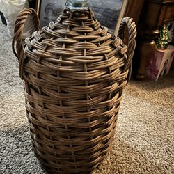 Old wicker wine bottle