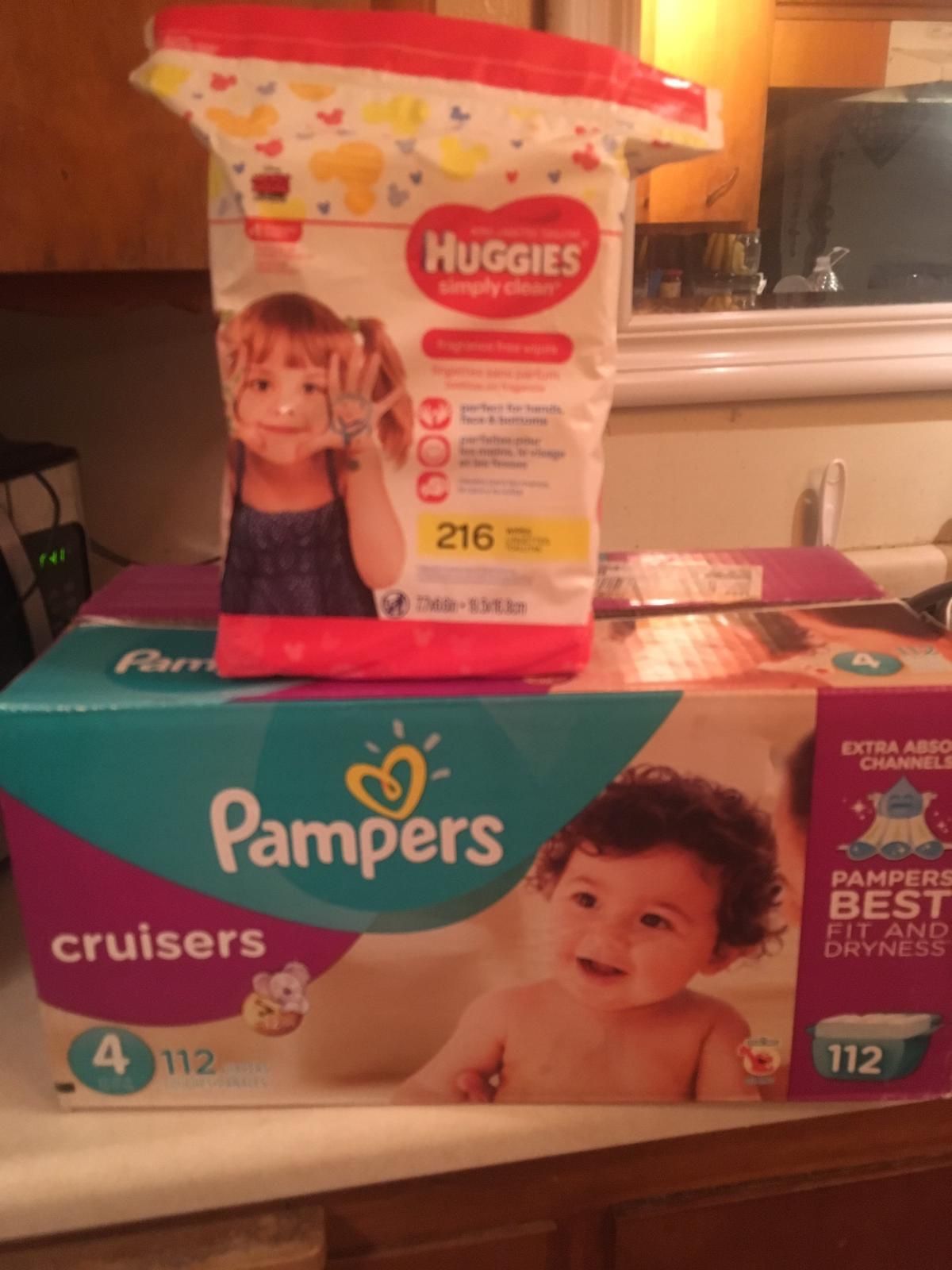 Pampers cruisers size 4 box and big packs of huggies wipes 216 count