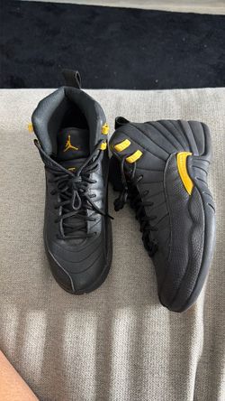 Air Jordan 12 Retro Black Taxi Sneakers