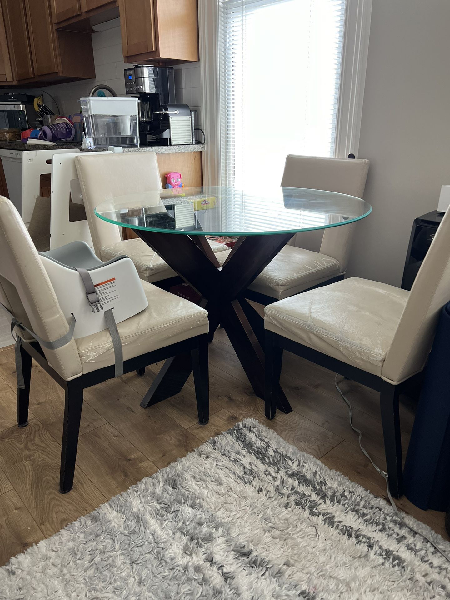 42’ Round glass Dining Room Table with chairs 