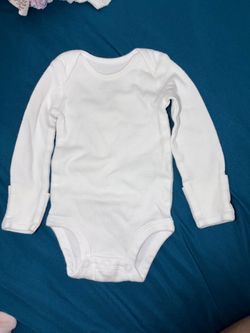 Carter’s white long sleeve bodysuit