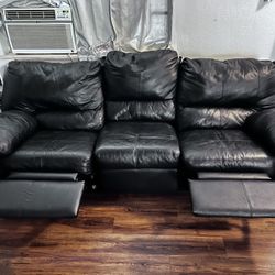 Black faux leather couch