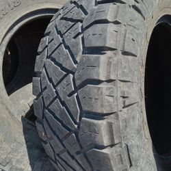 305x65x18 NITTO RIDGE GRAPPLER TIRES (2)
