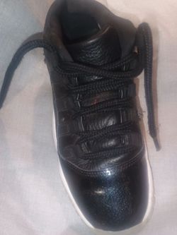 kid's Air Jordan 11s, size 4.5Y.