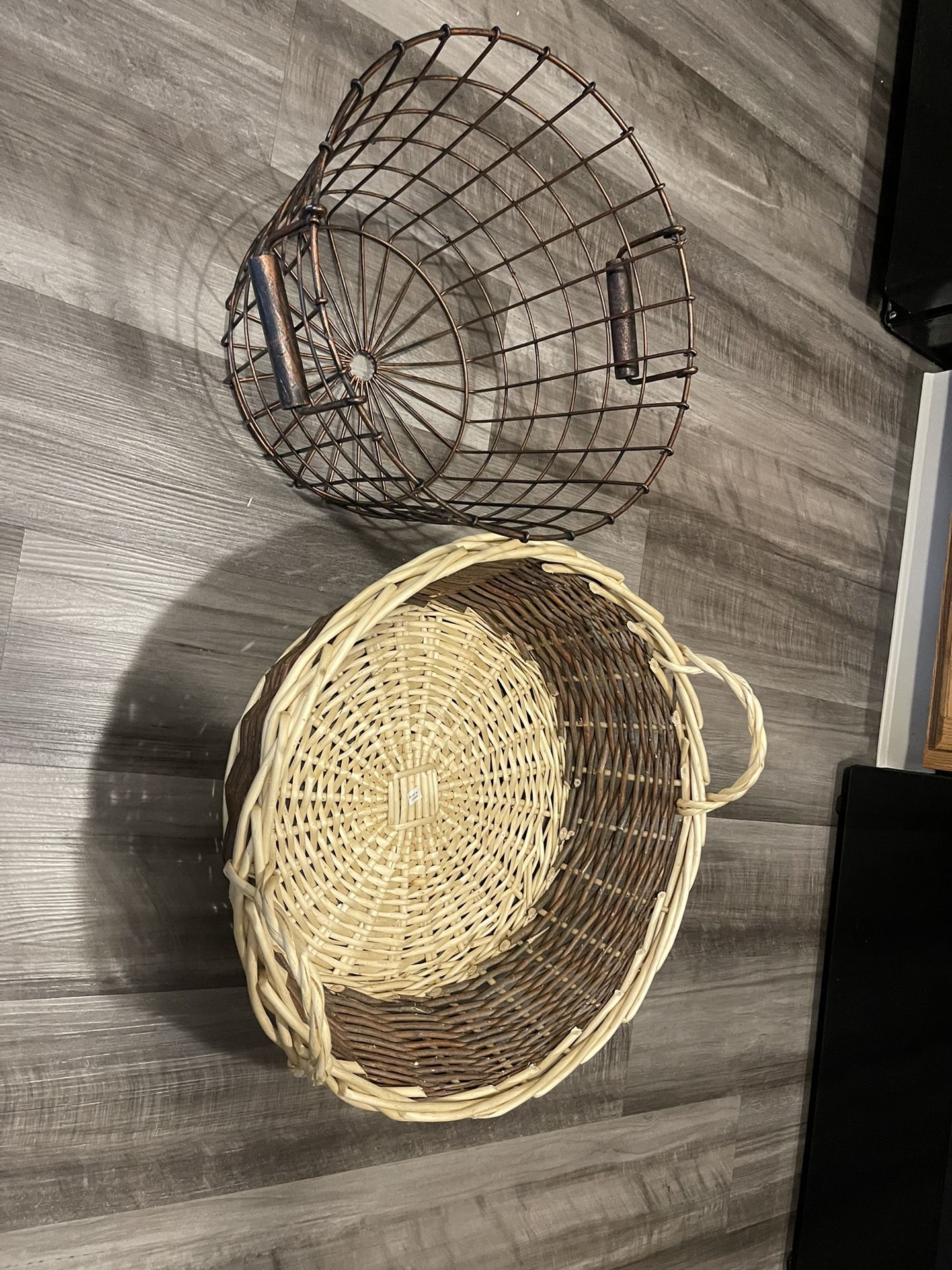1 Large wicker basket and 1 copper metal basket