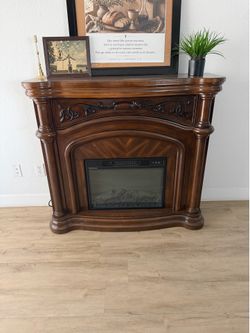 Electric fireplace with mantel