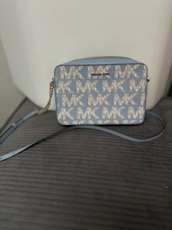 Mk cross body
