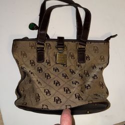 Dooney & Bourke bucket bag signature logo