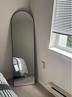 Arched floor mirror