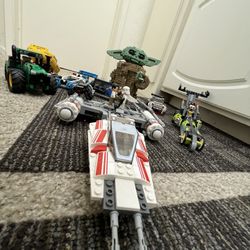 Assorted LEGOs Baby Yoda- Star Wars- Technic- Race Car- Tractor- Ships