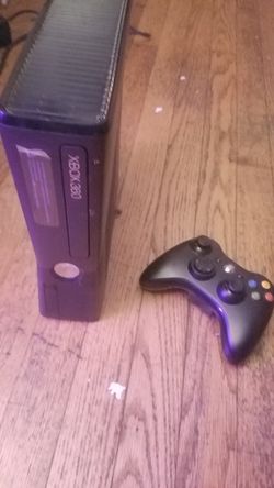 Xbox 360 and one controller.