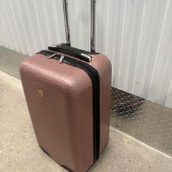 Joy Brand, hardshell  pink  luggage. Spinner 23 “ high   $50