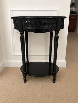 Black Oval Accent Table with Lower Shelf