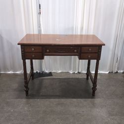 Traditional Reddish-Brown Wood Desk with Ornate Legs