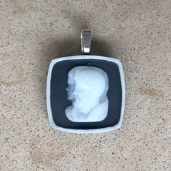 ⚫️ Unique, brown and white, raised resin double cameo pendant