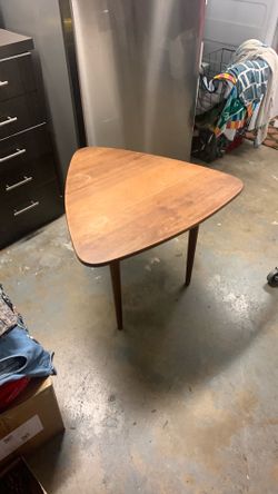 Nice mid-century guitar pick end table length 26 Hight 21 has a couple of glass rings from not using a coaster