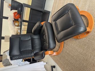 2 black faux leather swivel recliners + ottomans — $100 each or $180 both