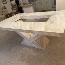 Modern dining room table with extension leaves