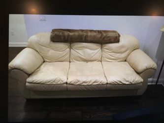 Tan leather sleeper sofa