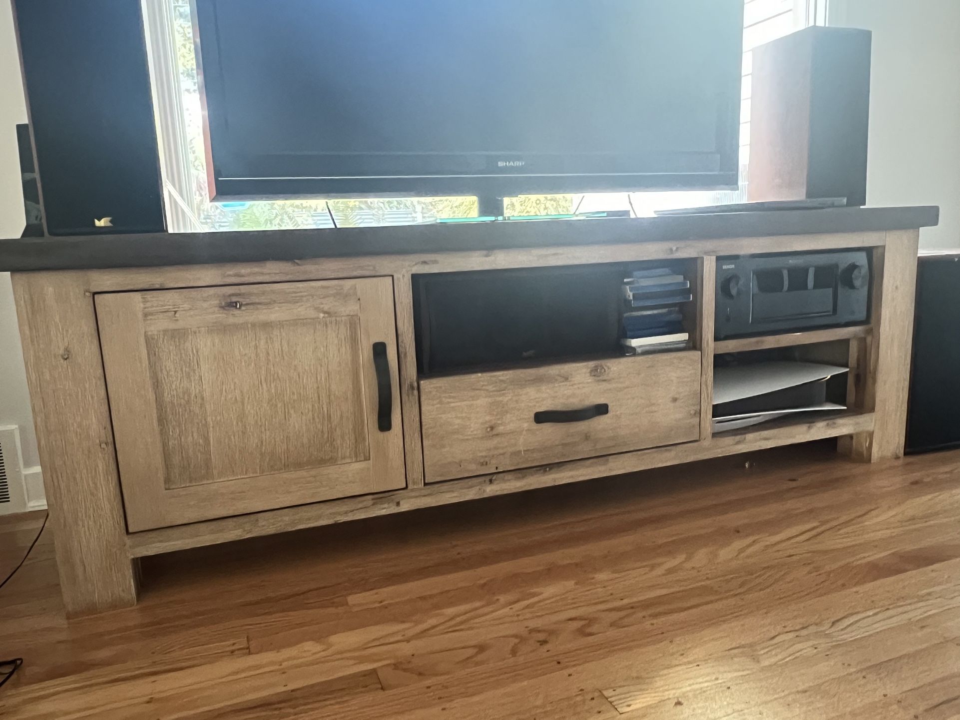 Wood and Finished Concrete Media Center
