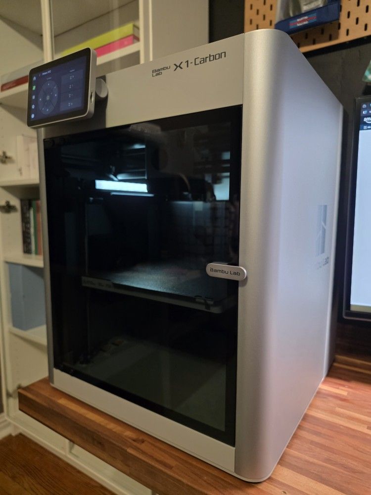 Bambu Lab X1C 3D Printer with less than 100hrs 