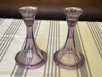 A pair of Art Deco amethyst glass candlestick holders. 6.5” tall