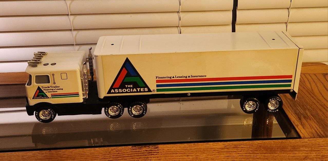 Vintage Nylint Steel Tractor/Trailer/The Associates Advertising