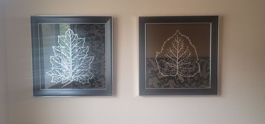 Two pieces of framed Art with Silver Leaf design