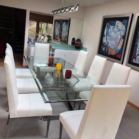 Contemporary Glass Dining Room Table w/8 White Fabric Chairs.