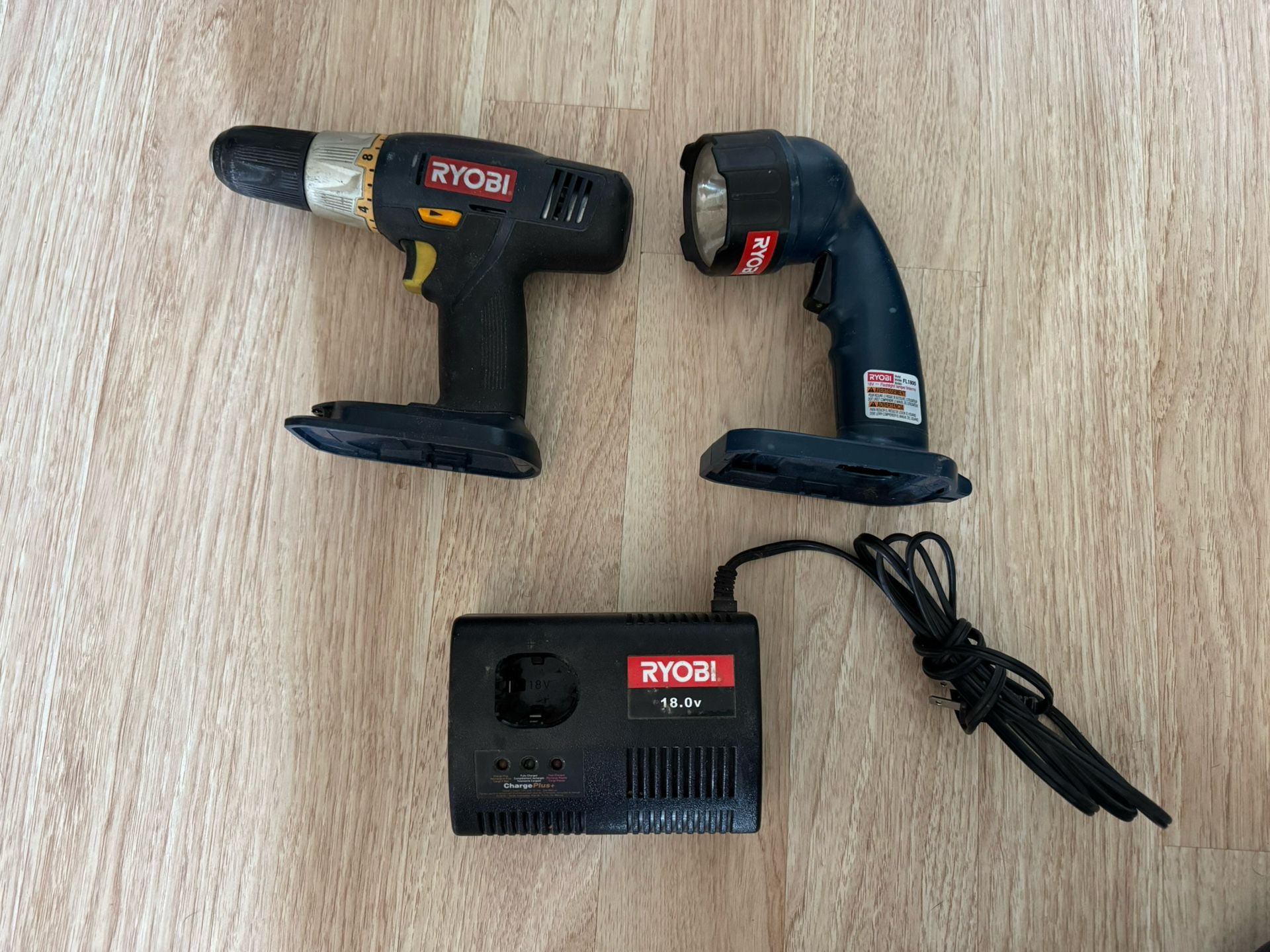 Ryobi 18.0v Drill, Light And Charger (no batteries)