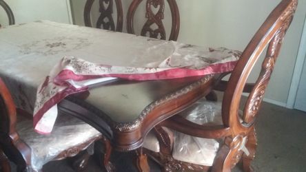 Ashley heavywood dinning table like new asking 1200 payed 2900